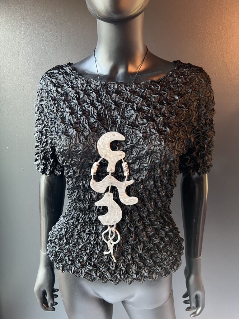 Rain Dance— Cold Forged Aluminum Pendant